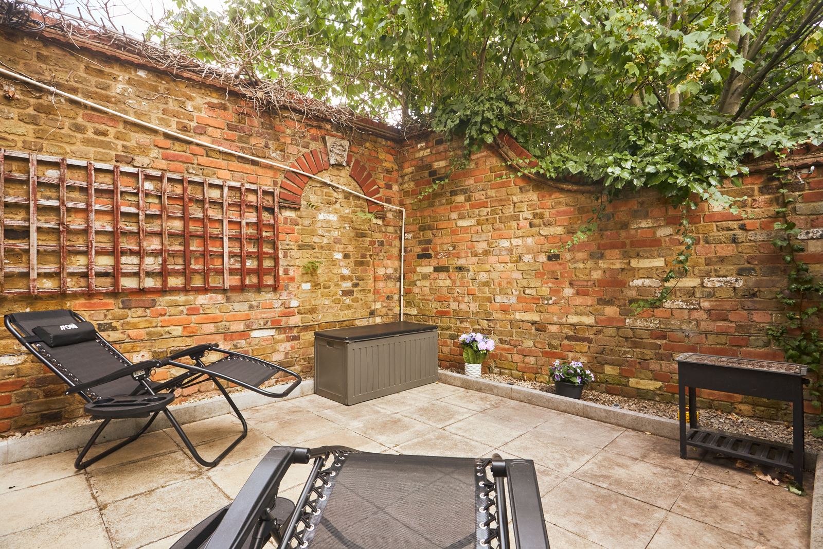 Garden corner with storage box and BBQ