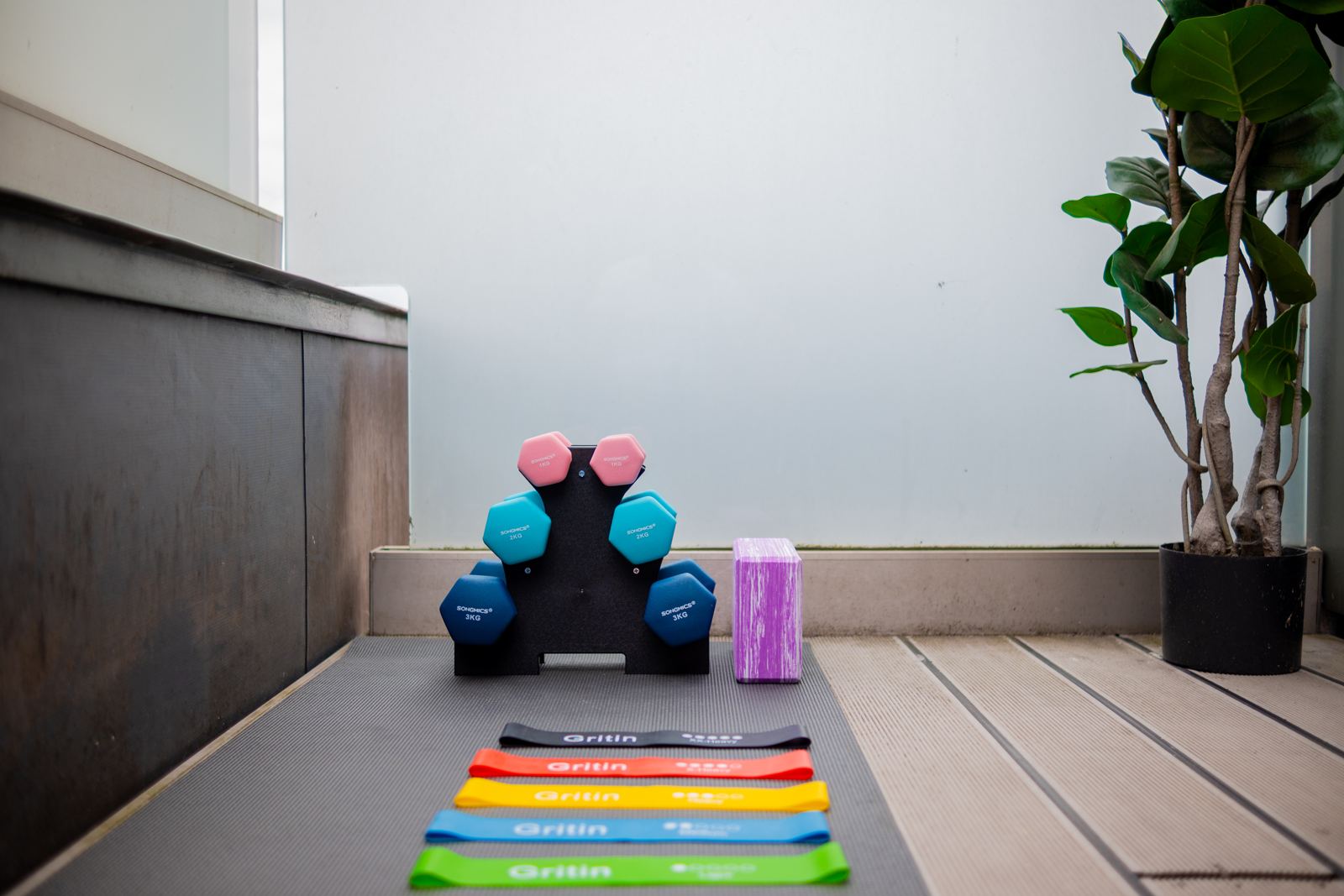 Home workout kit with dumbbells, bands and yoga block