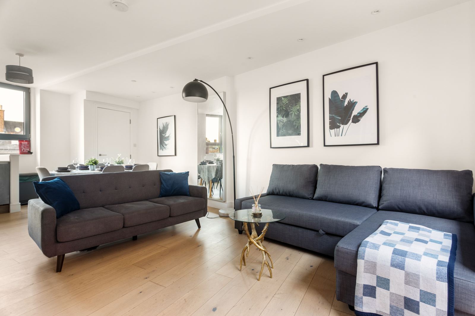 Living room, dining table and kitchen