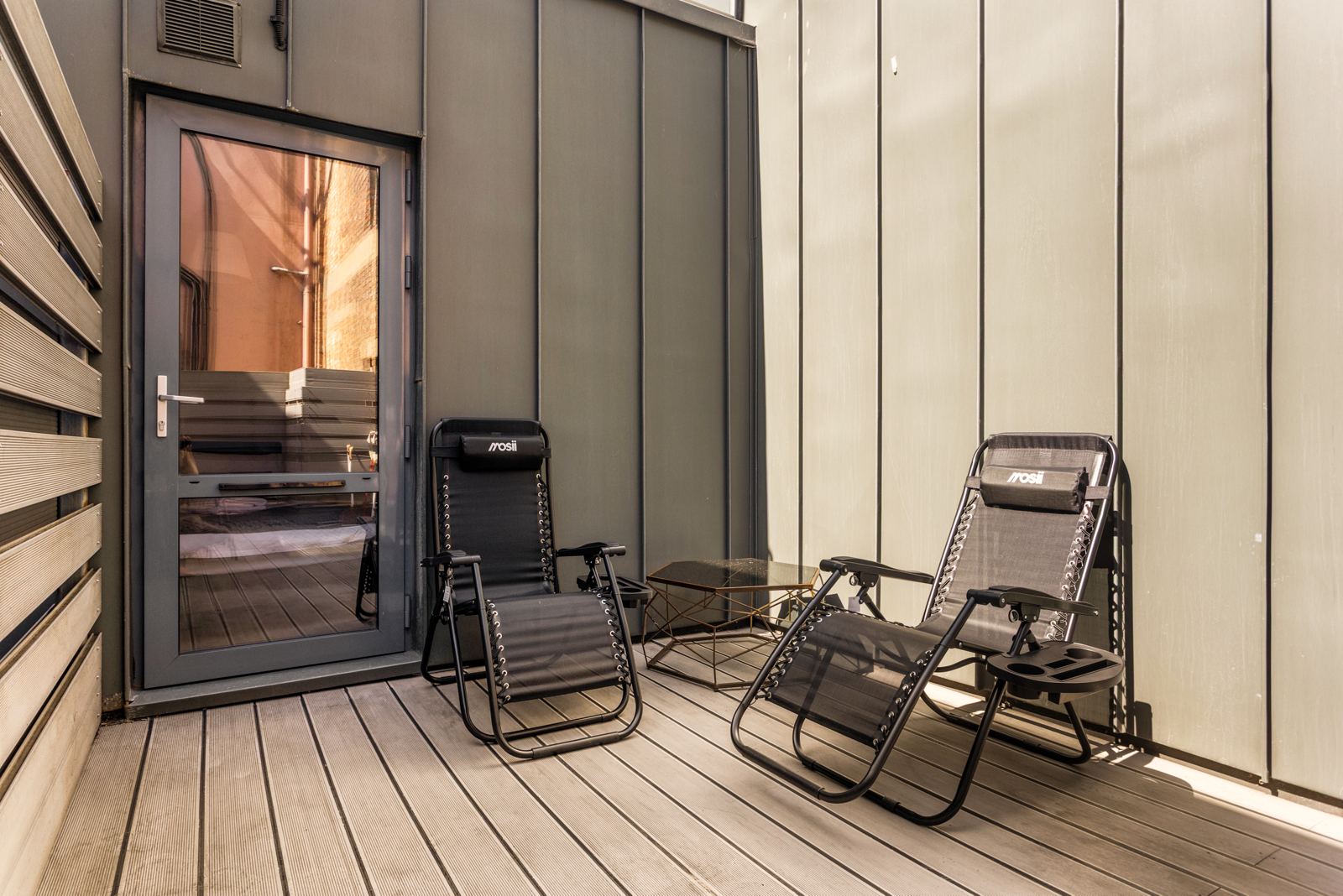 Terrace with two reclining chairs